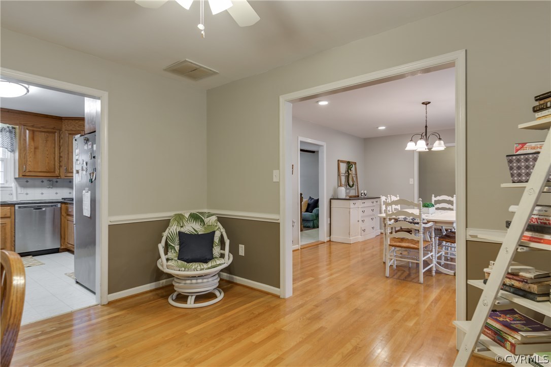 20009 White Oak Road Sutherland, VA 23885 - Photo 19 of 31 Spacious den with hardwood floors.