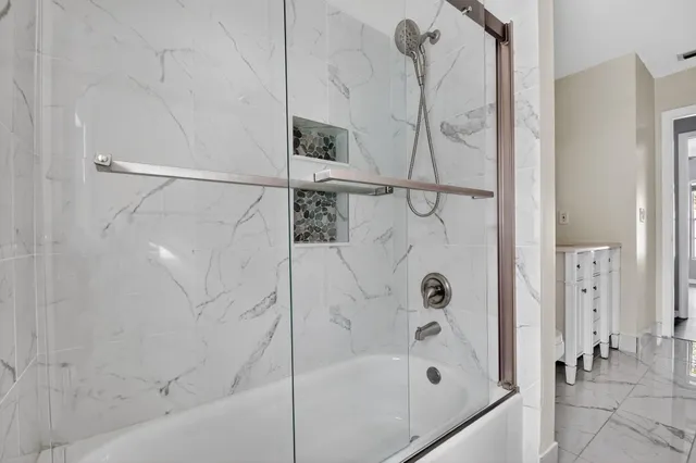 a view of a backyard with swimming pool