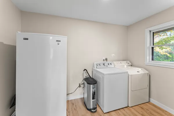 a utility room with dryer and washer