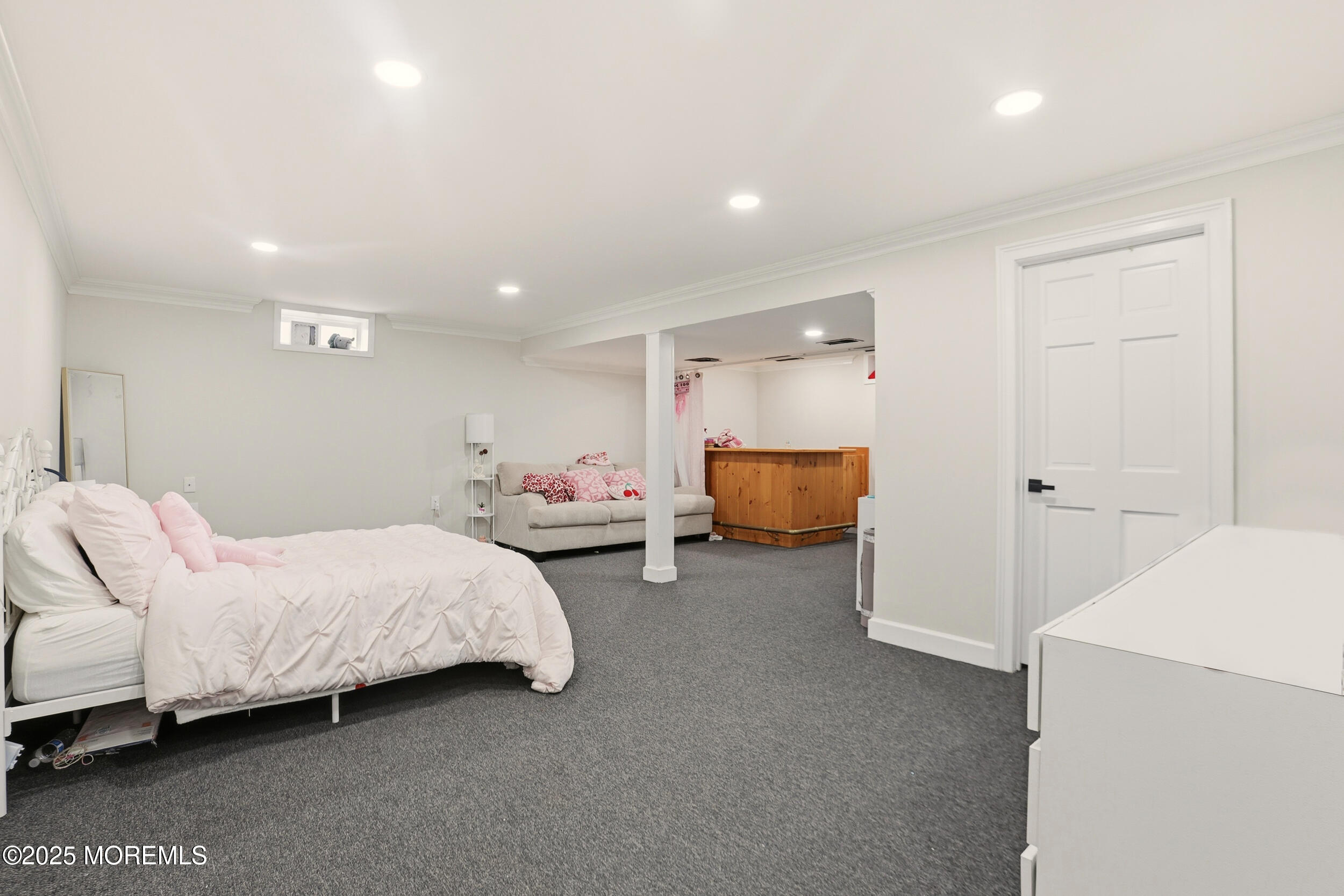 28 Bronia Street Howell, NJ 07731 - Photo 11 of 34 a bed room with a bed and a chair