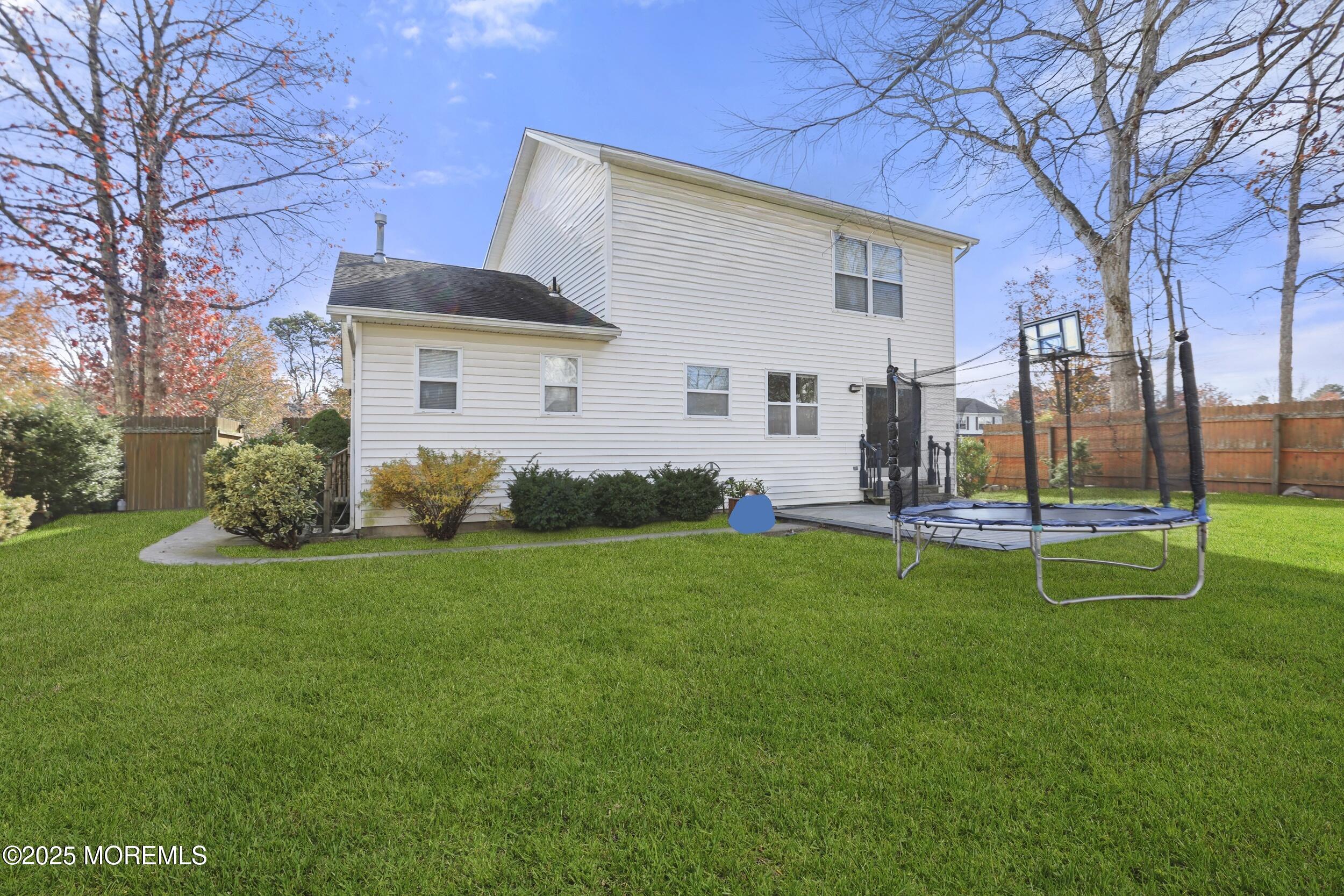 28 Bronia Street Howell, NJ 07731 - Photo 14 of 34 a front view of house with yard and green space