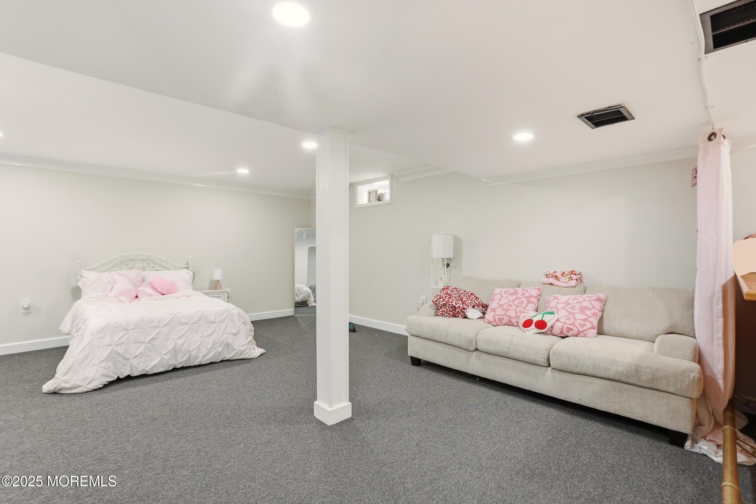 28 Bronia Street Howell, NJ 07731 - Photo 30 of 34 a bedroom with furniture and white walls