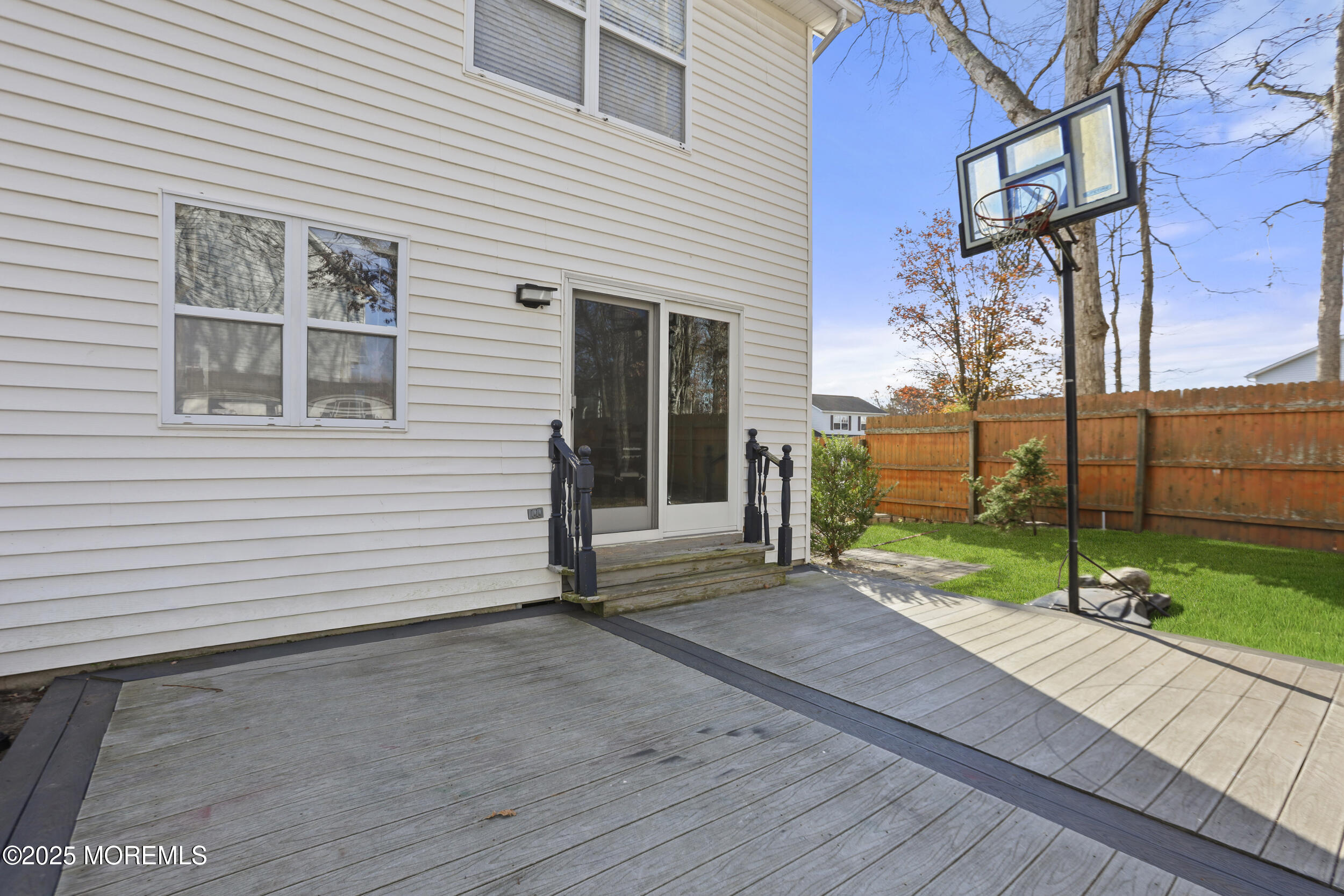28 Bronia Street Howell, NJ 07731 - Photo 33 of 34 a view of a house with backyard and a tree