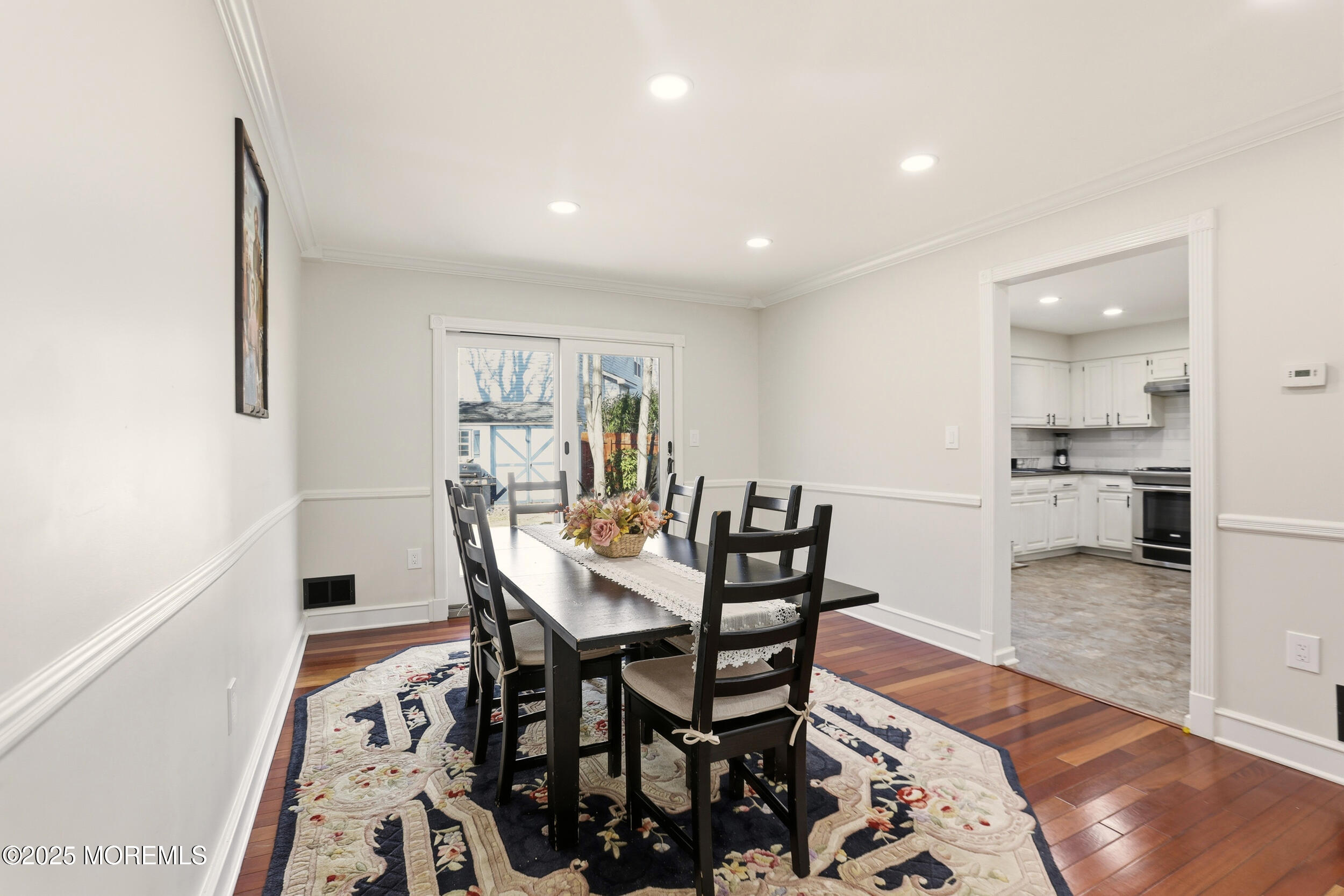 28 Bronia Street Howell, NJ 07731 - Photo 5 of 34 a view of a dining room with furniture and wooden floor