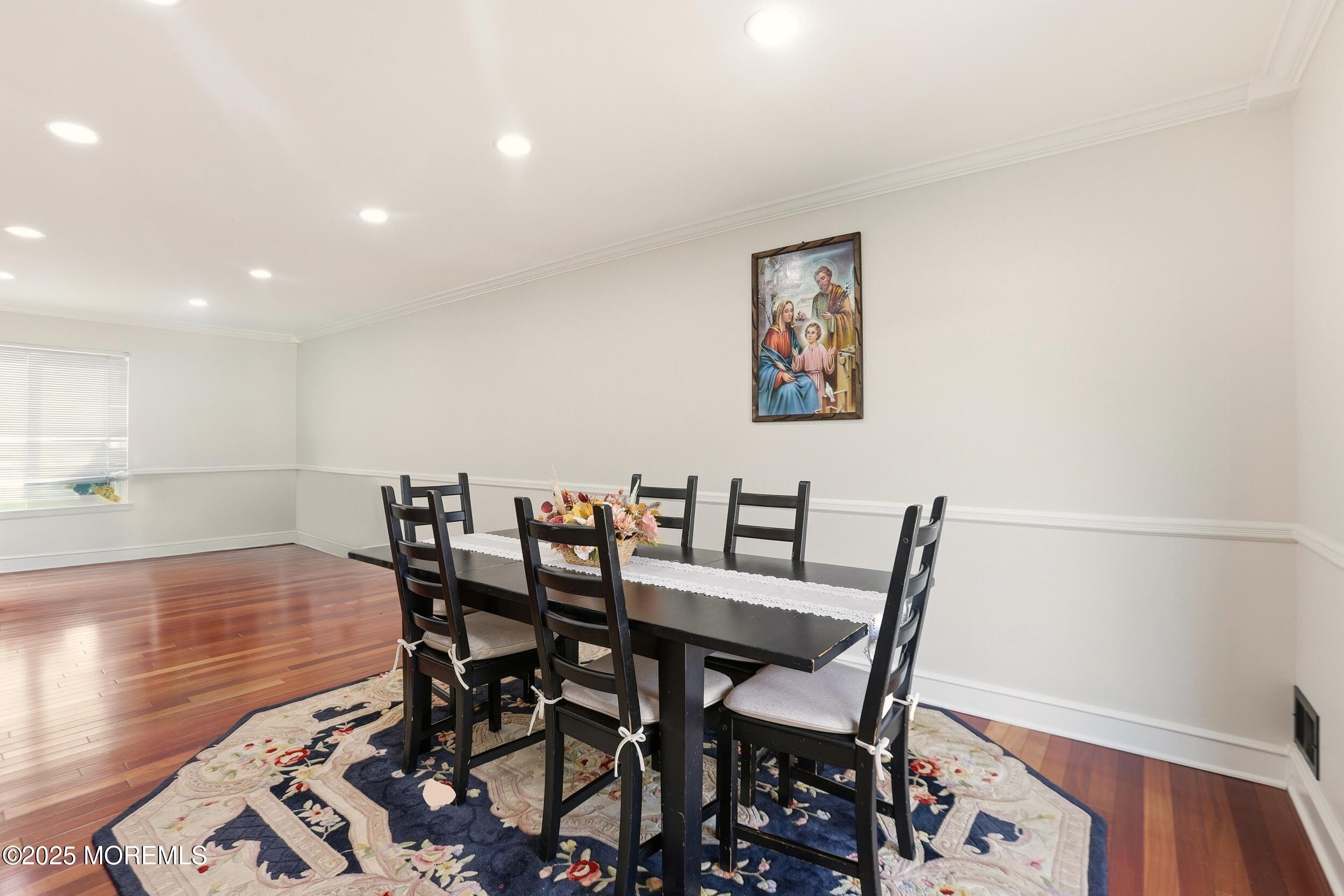 28 Bronia Street Howell, NJ 07731 - Photo 6 of 34 a view of a dining room with furniture and wooden floor