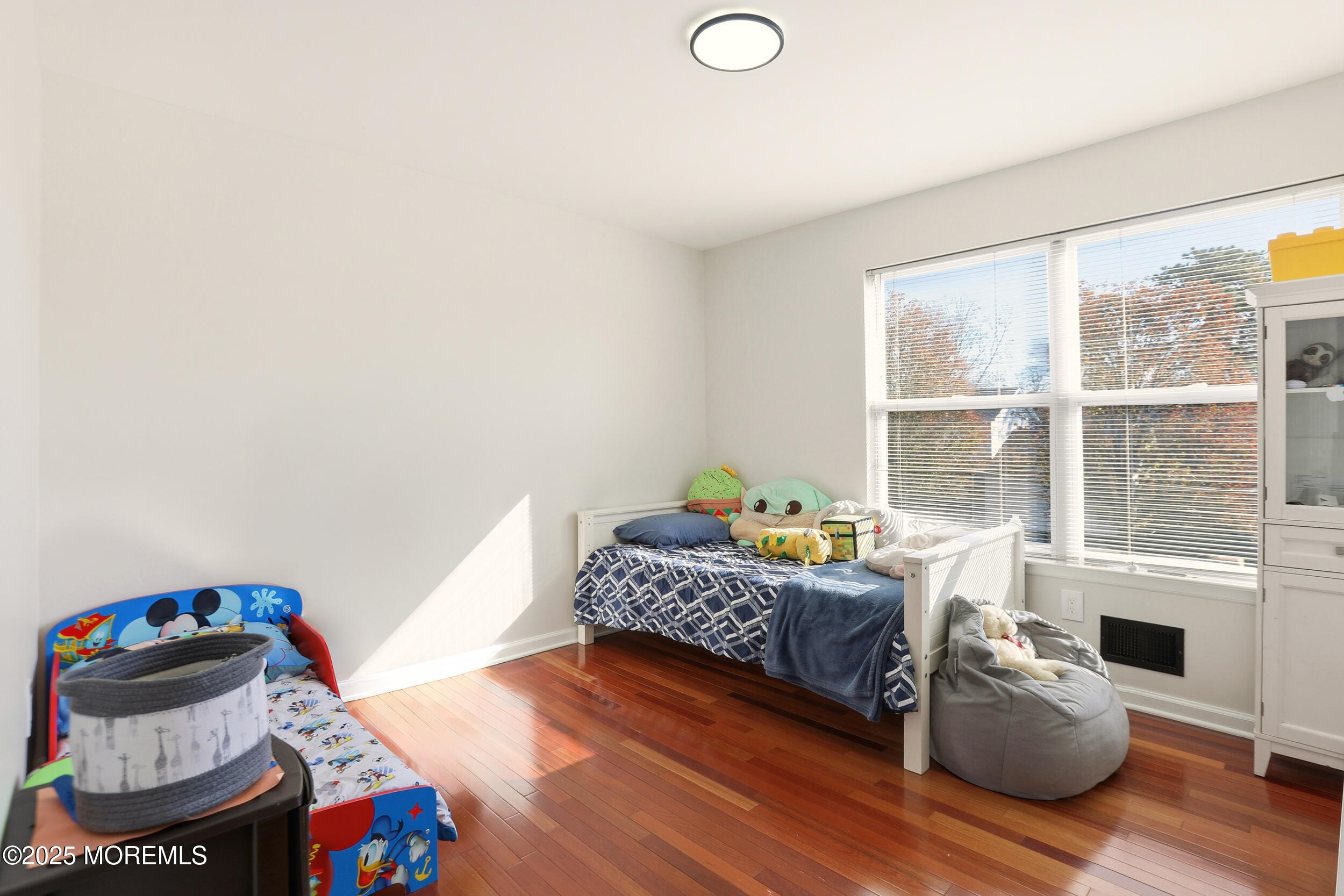 28 Bronia Street Howell, NJ 07731 - Photo 10 of 34 a bedroom with furniture and a large window