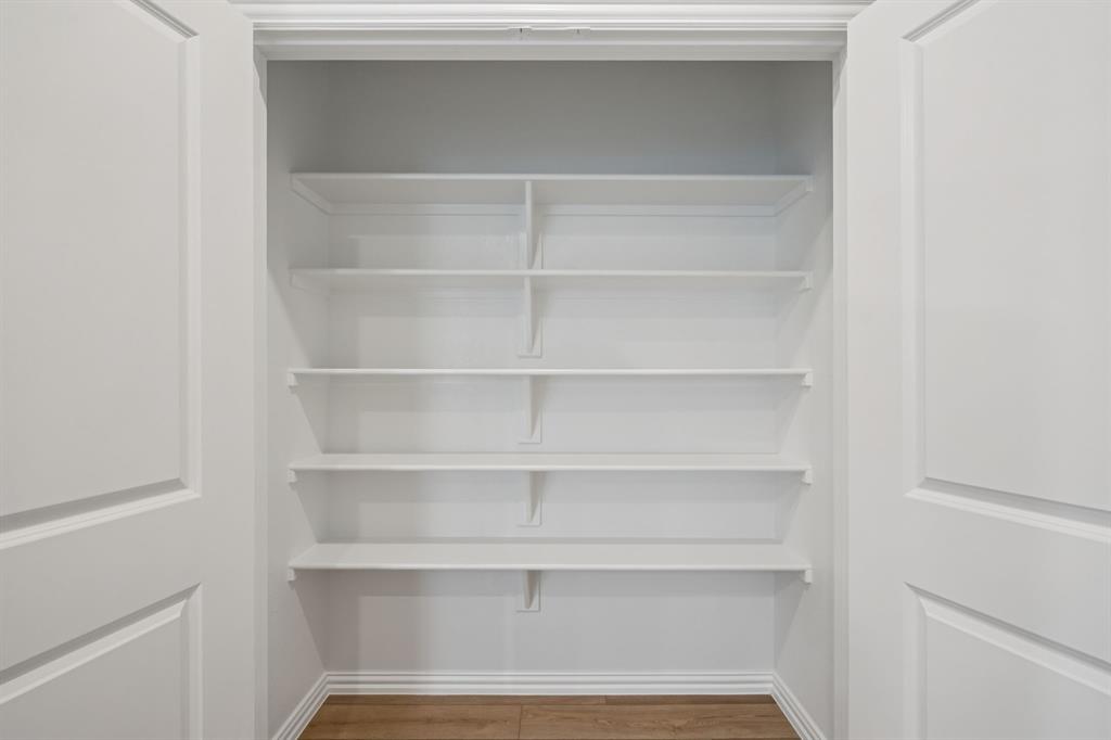 1704 Arches Road Anna, TX 75409 - Photo 14 of 35 Photo is not of the actual home, but is an inspirational photo of builder’s model home and may depict options, furnishings, and/or decorator features that are not included.