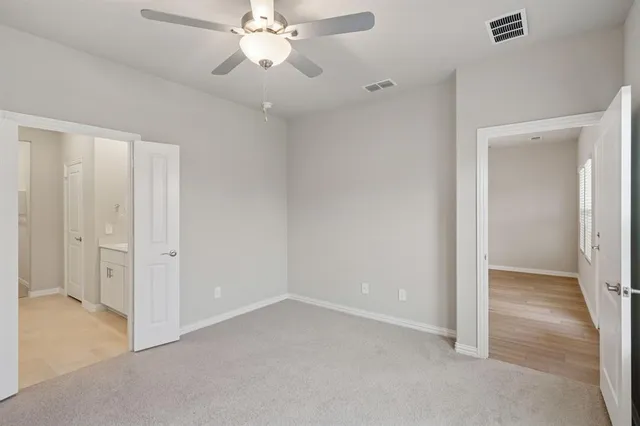 an empty room with a bathroom