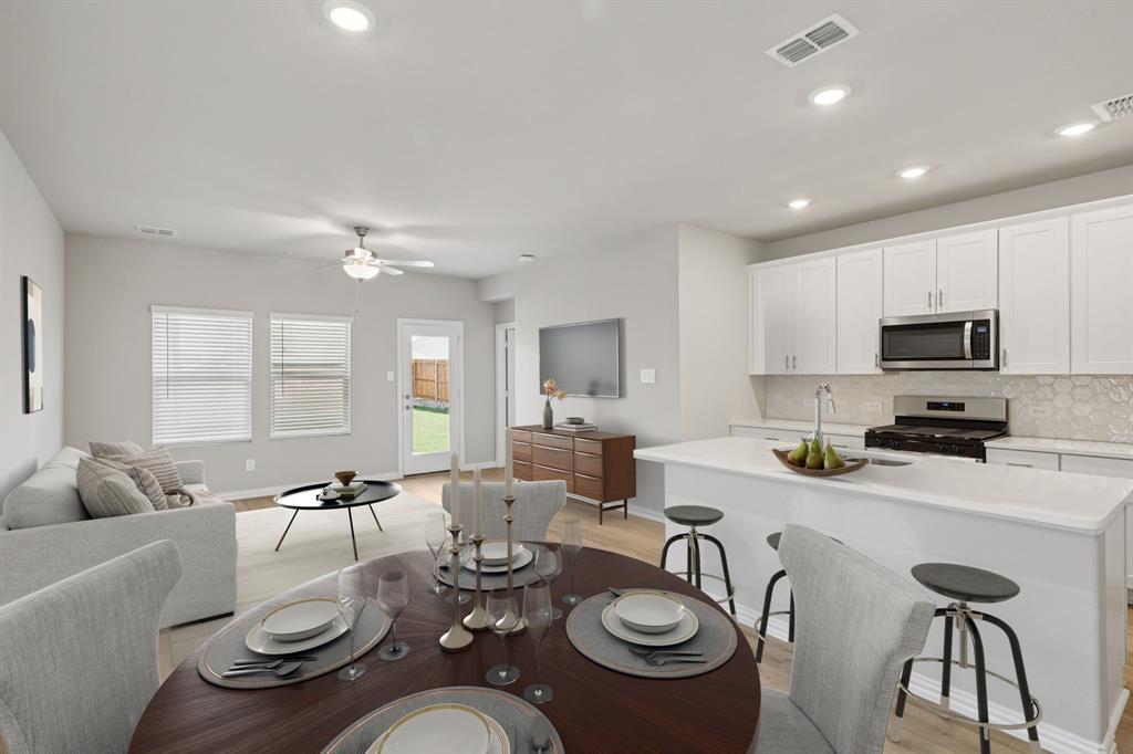 1704 Arches Road Anna, TX 75409 - Photo 4 of 35 Photo is not of the actual home, but is an inspirational photo of builder’s model home and may depict options, furnishings, and/or decorator features that are not included.