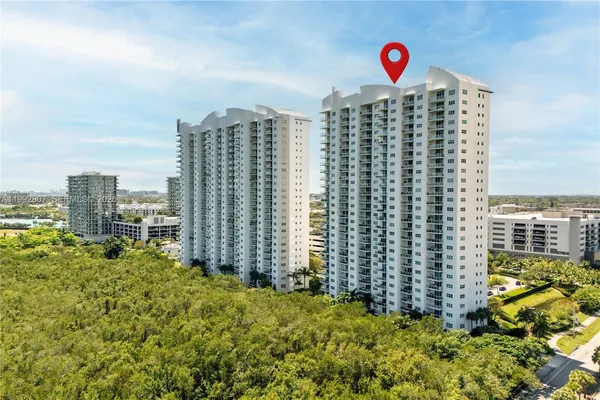 a street view with tall buildings