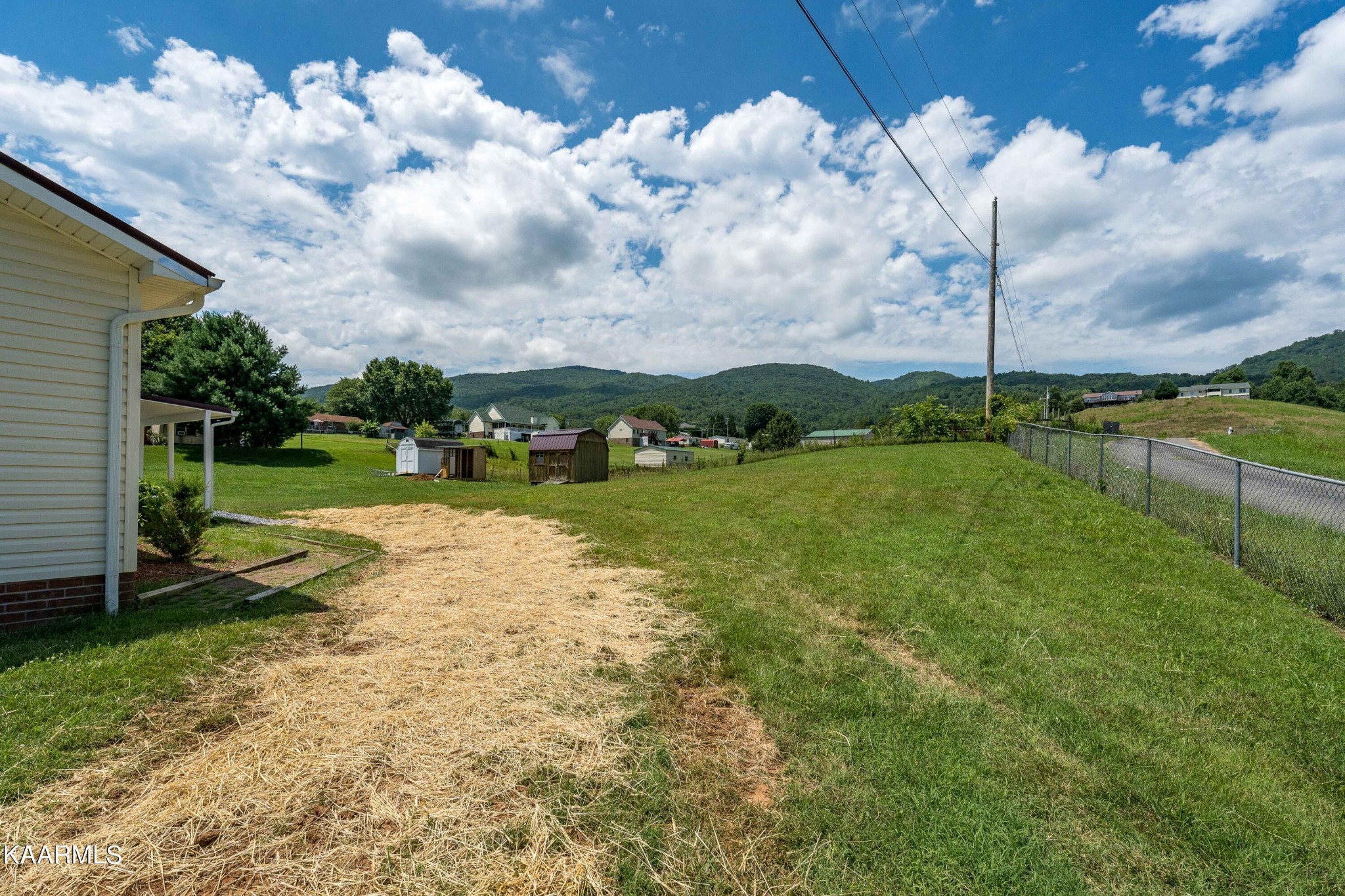 212 George Bowers Road Elizabethton, TN 37643 - Photo 11 of 49 a view of a fountain in front of a house