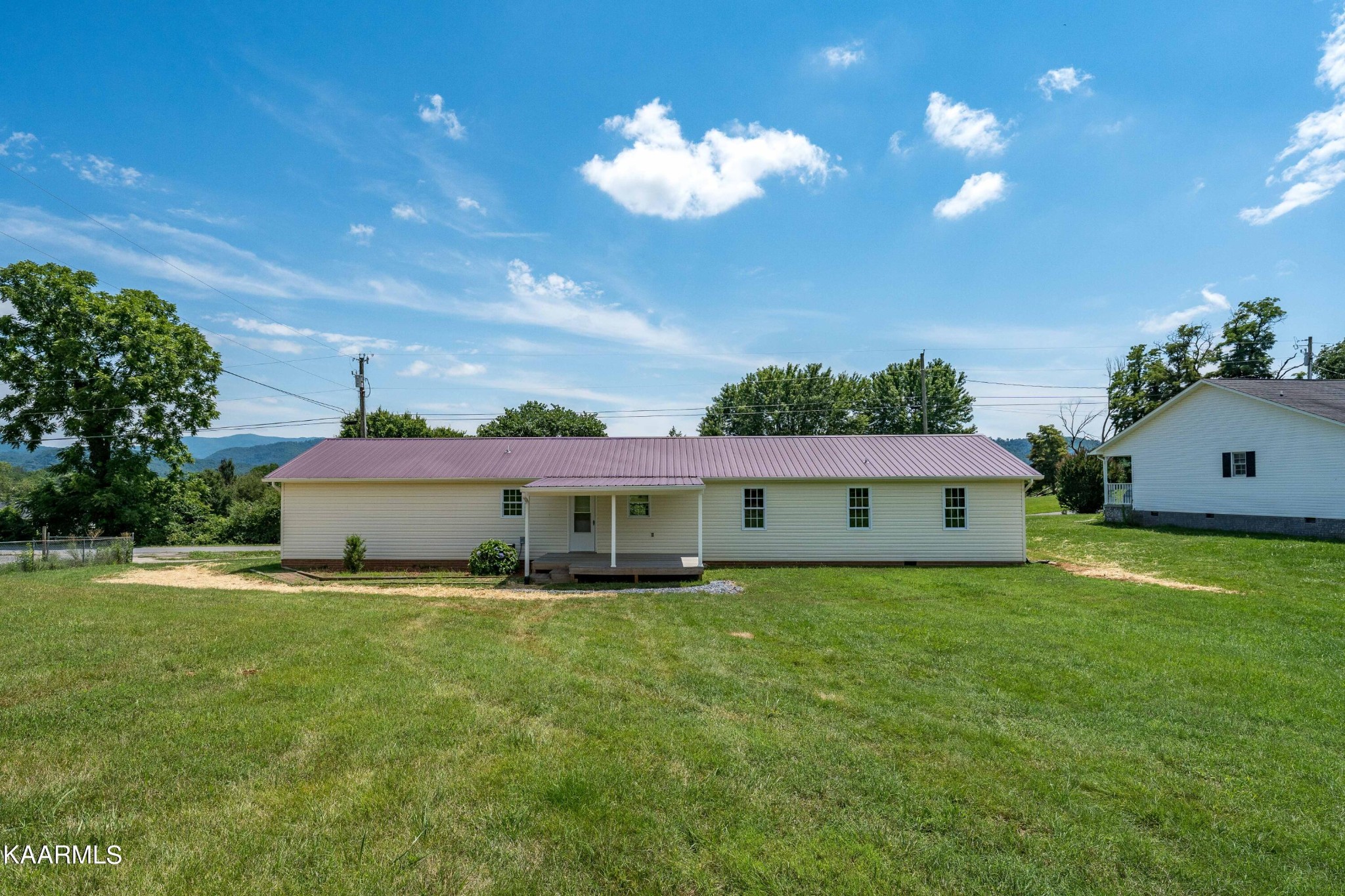 212 George Bowers Road Elizabethton, TN 37643 - Photo 13 of 49 a view of a house with a big yard