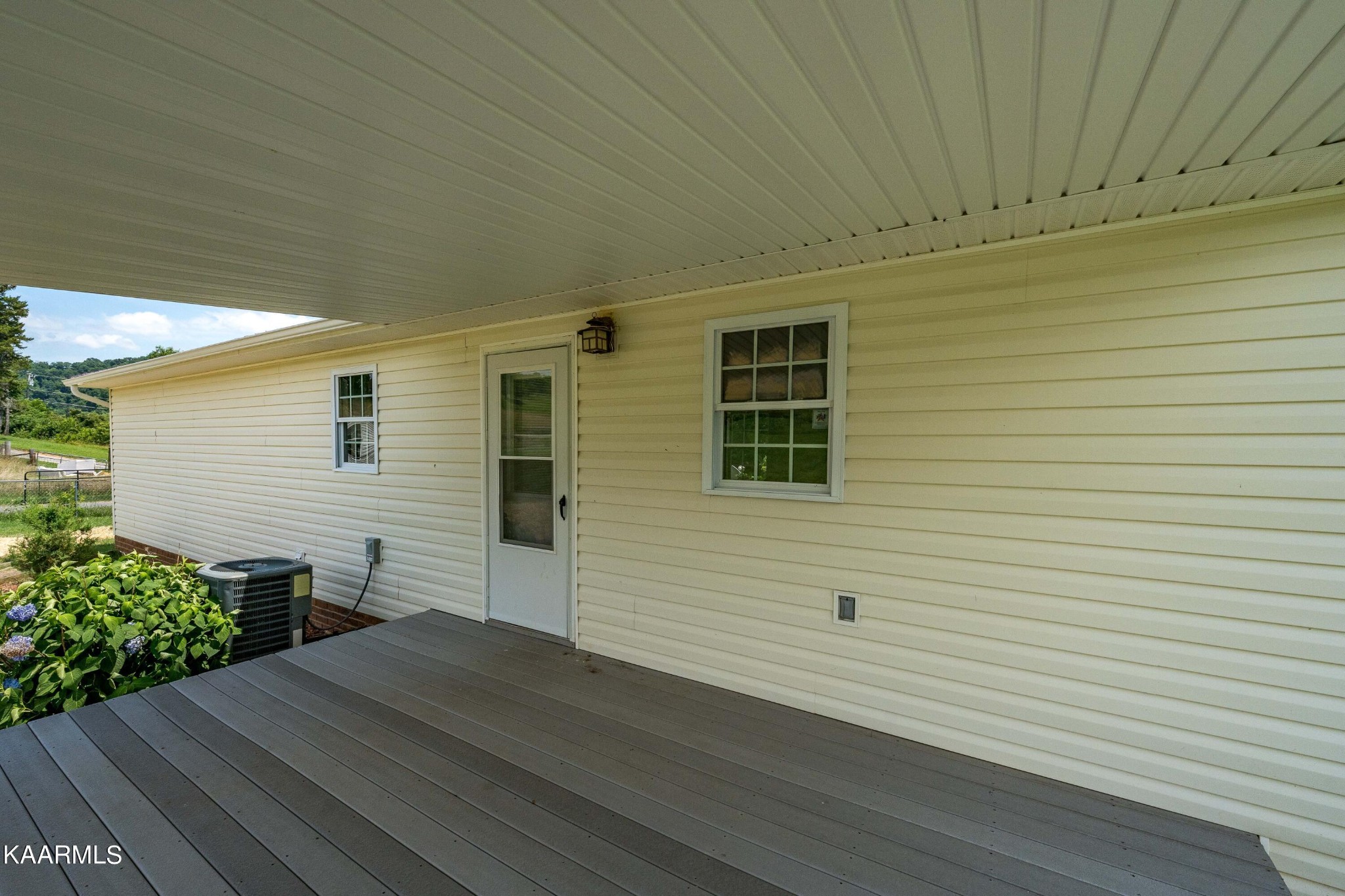 212 George Bowers Road Elizabethton, TN 37643 - Photo 20 of 49 a view of house with backyard