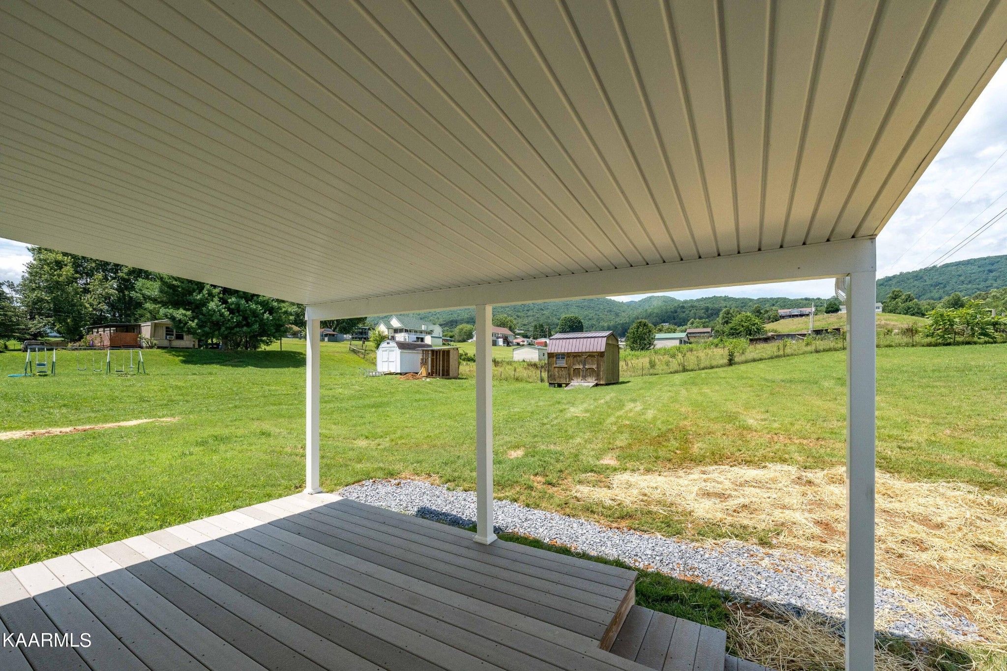 212 George Bowers Road Elizabethton, TN 37643 - Photo 22 of 49 a view of a house with backyard from a balcony