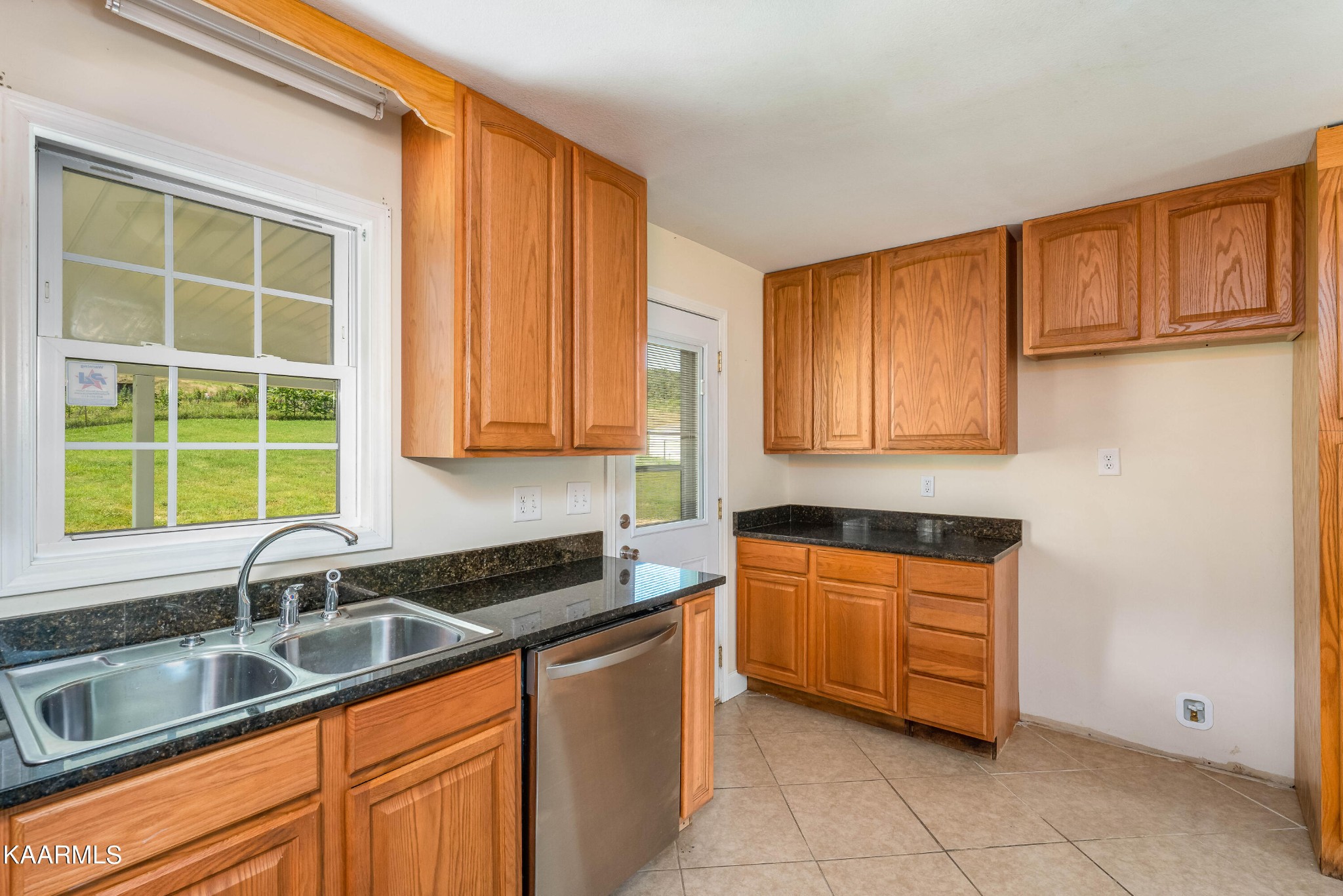 212 George Bowers Road Elizabethton, TN 37643 - Photo 35 of 49 a kitchen with a sink and cabinets