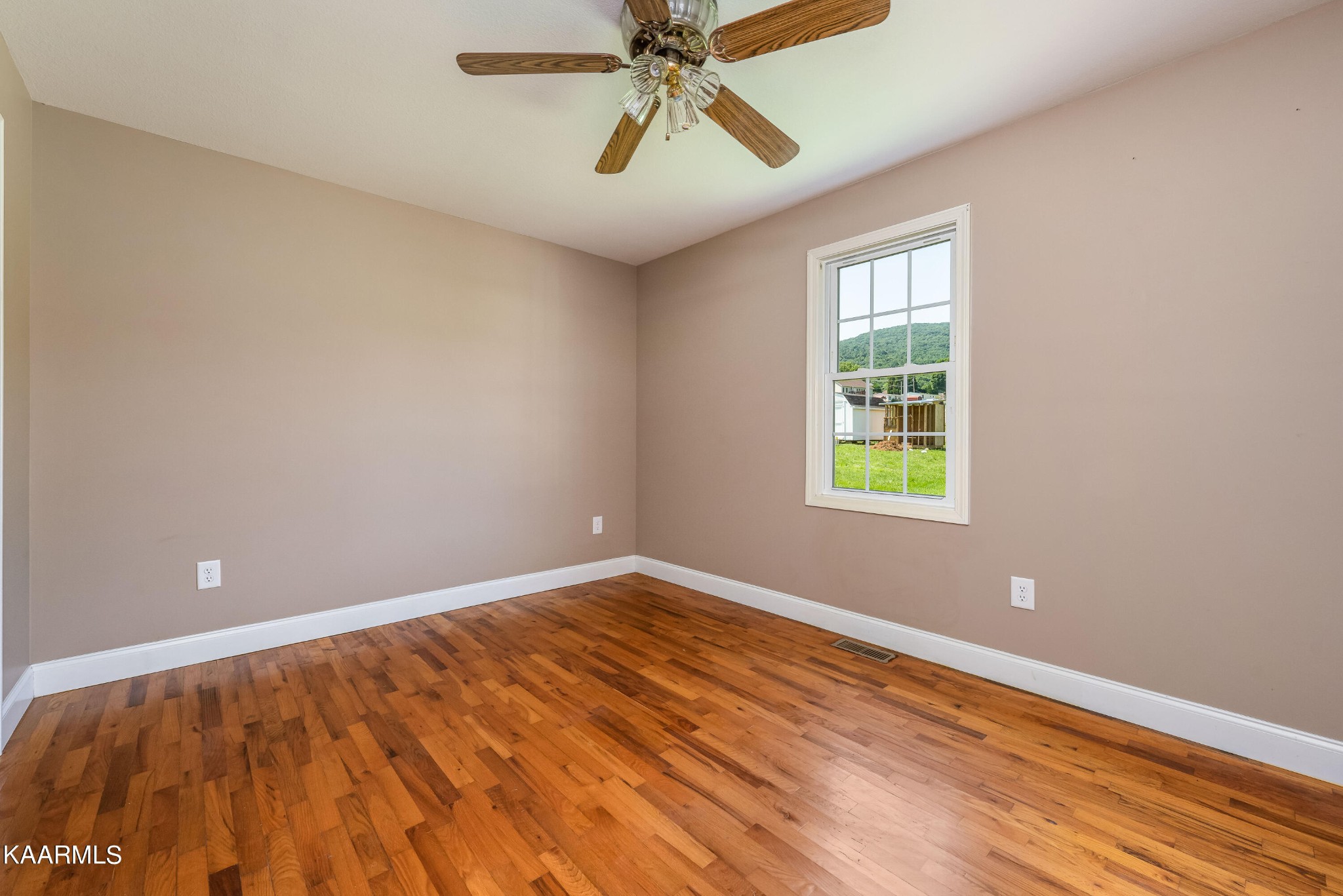 212 George Bowers Road Elizabethton, TN 37643 - Photo 46 of 49 a view of room with window and ceiling fan