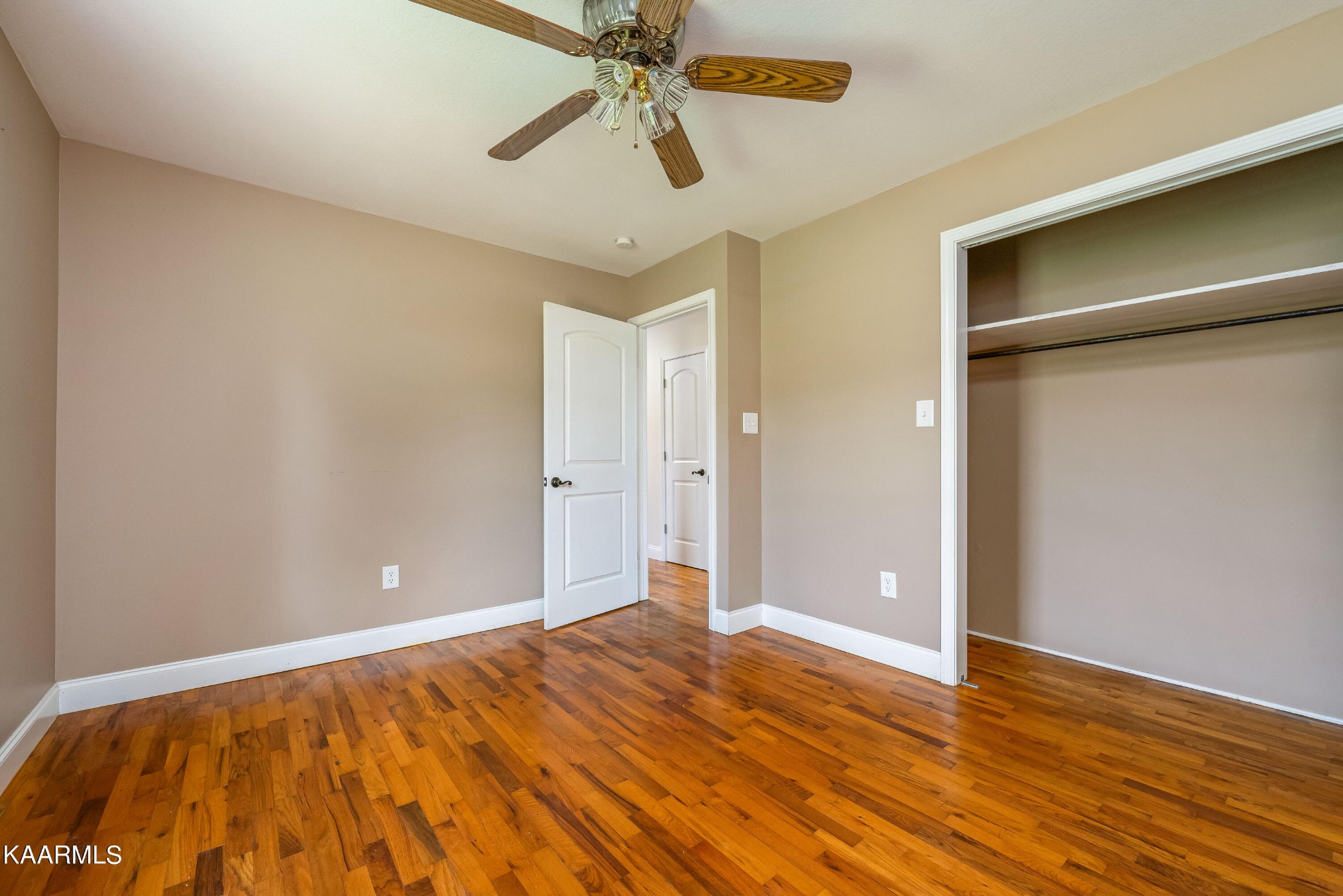 212 George Bowers Road Elizabethton, TN 37643 - Photo 47 of 49 a view of room with wooden floor and fan