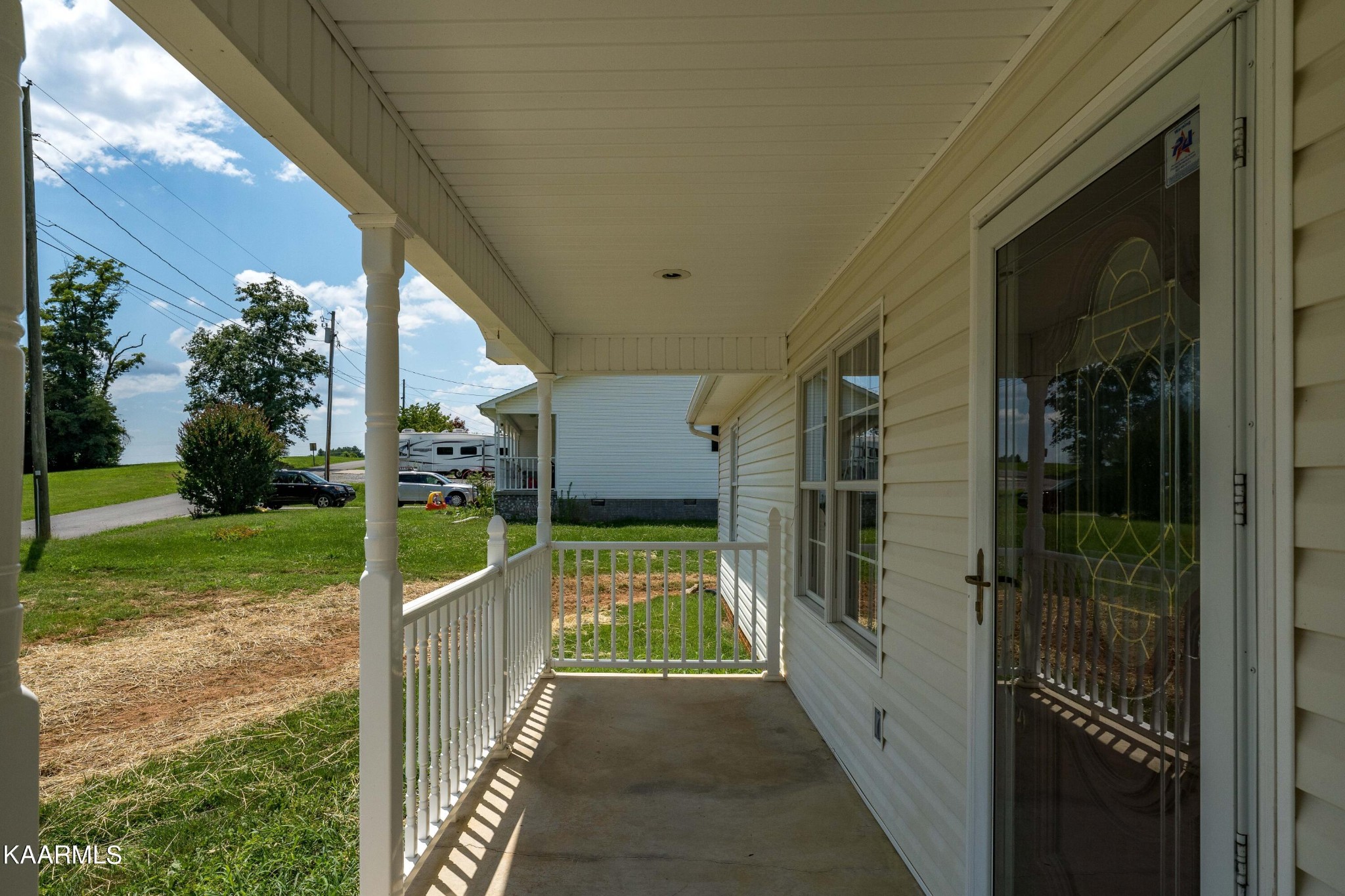 212 George Bowers Road Elizabethton, TN 37643 - Photo 7 of 49 a view of a house with a porch