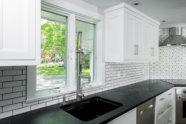 190 Damons Point Road Marshfield, MA 02050 - Photo 5 of 23 a kitchen with a sink and a window