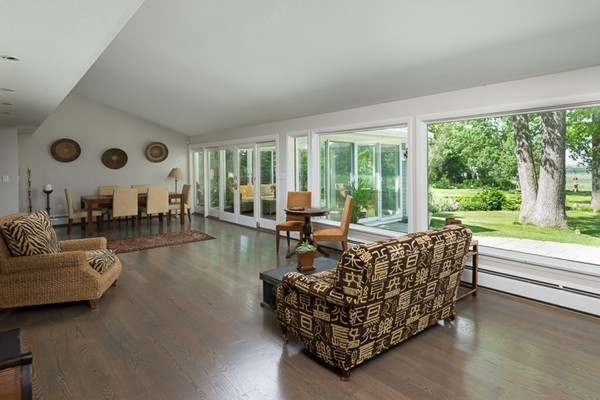 190 Damons Point Road Marshfield, MA 02050 - Photo 7 of 23 a living room with furniture and a large window