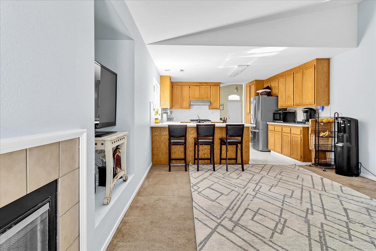 715 Skinner Street Soledad, CA 93960 - Photo 14 of 35 a view of a kitchen with furniture and window
