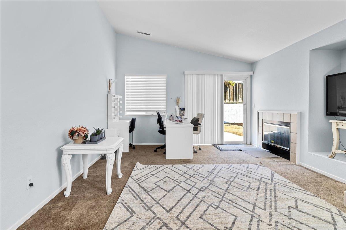 715 Skinner Street Soledad, CA 93960 - Photo 16 of 35 a bedroom with furniture and a window