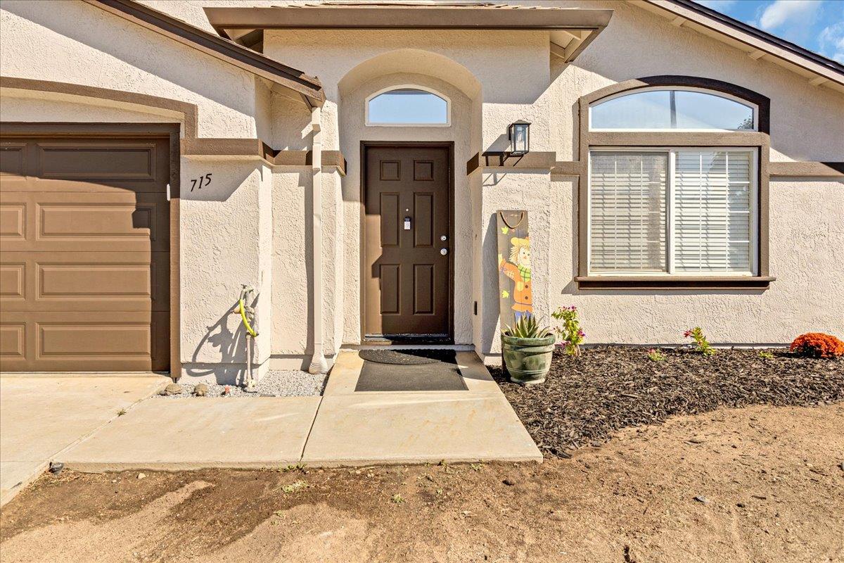 715 Skinner Street Soledad, CA 93960 - Photo 4 of 35 a front view of a house with garden
