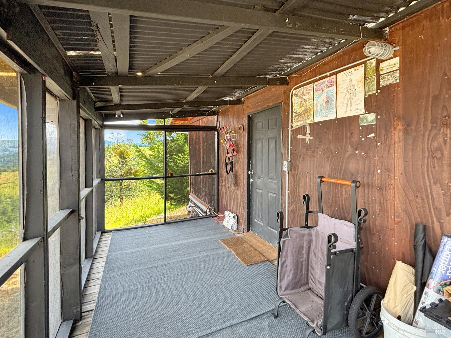 56801 Registered Guest Road Laytonville, CA 95454 - Photo 6 of 22 a view of a porch with a table and chairs