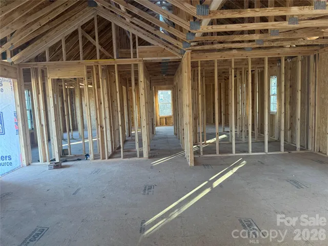 a view of an empty room with glass door