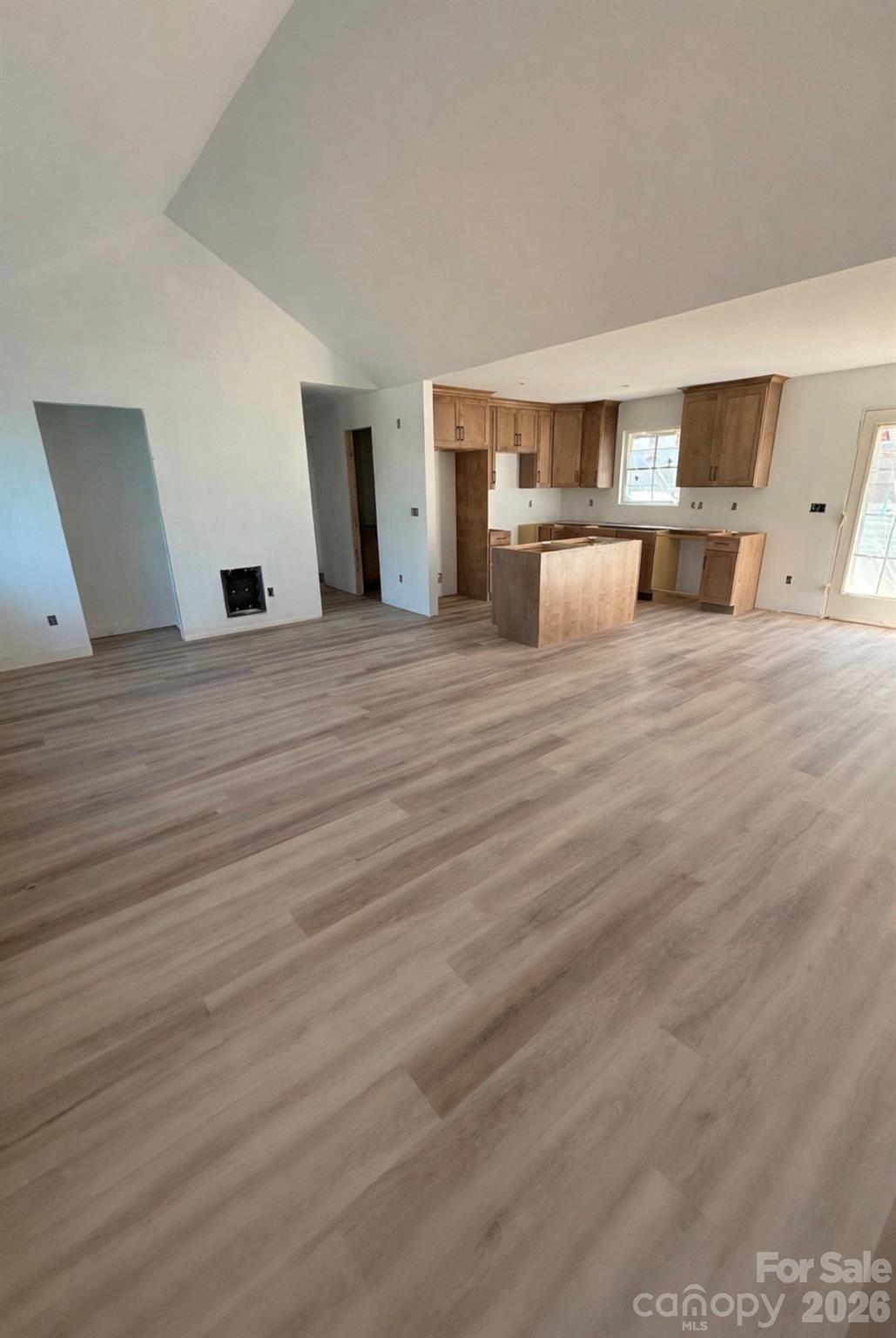 4269 Love Mill Road Stanfield, NC 28163 - Photo 4 of 12 a view of empty room with wooden floor