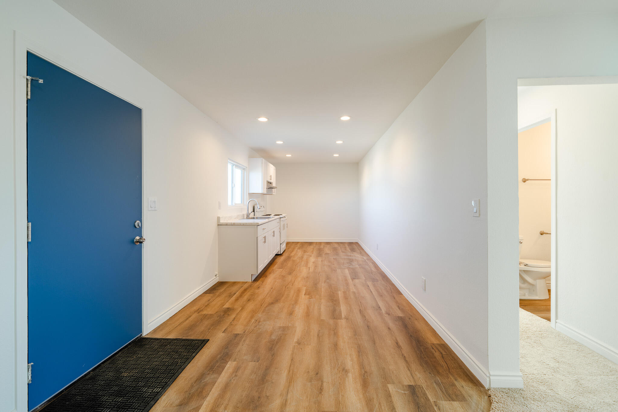 8443 Gaskell Road Rosamond, CA 93560 - Photo 11 of 45 a view of livingroom with wooden floor