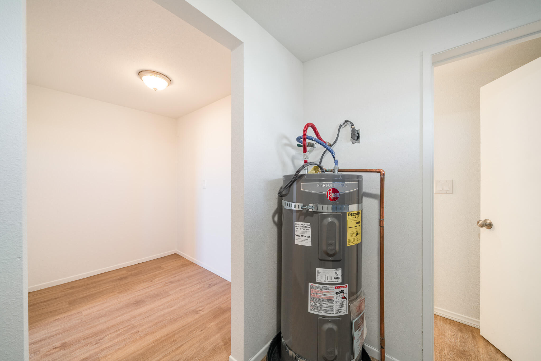 8443 Gaskell Road Rosamond, CA 93560 - Photo 21 of 45 a utility room with dryer and washer