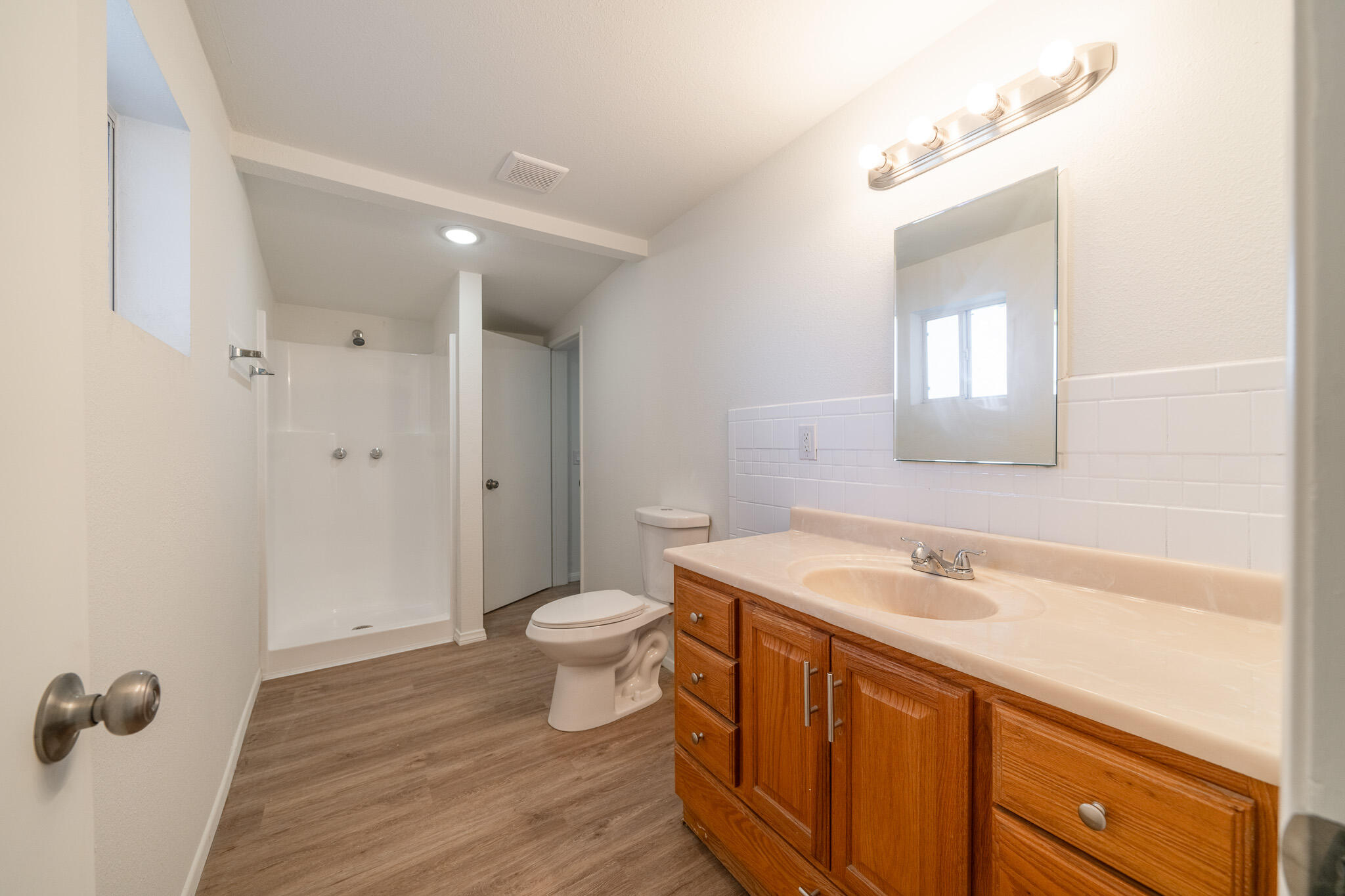 8443 Gaskell Road Rosamond, CA 93560 - Photo 37 of 45 a bathroom with a sink toilet and shower