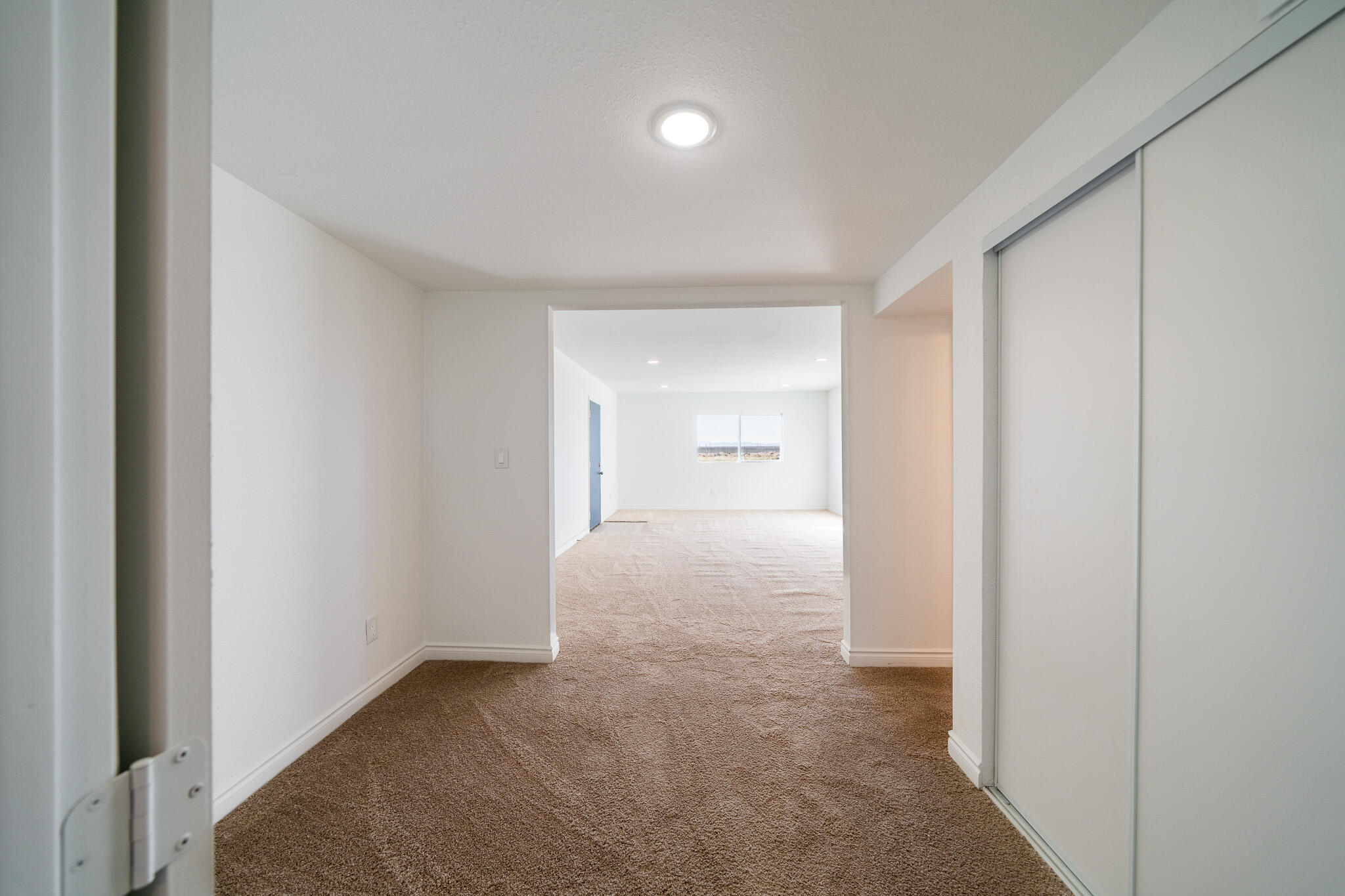 8443 Gaskell Road Rosamond, CA 93560 - Photo 38 of 45 a view of a room with an empty space and closet area