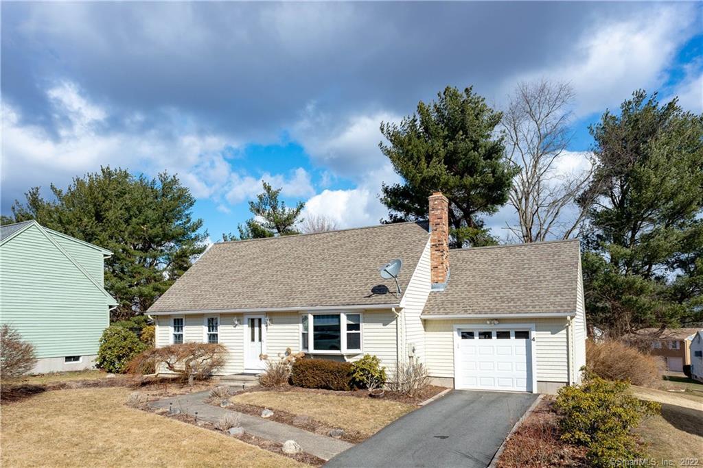 a house view with a garden space