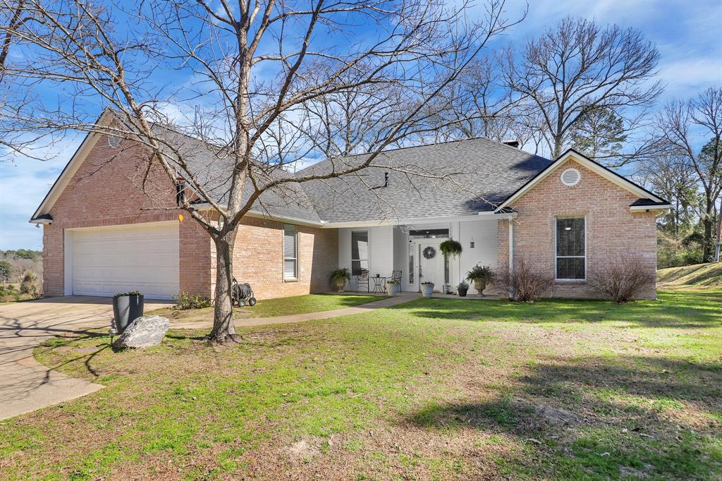 11521 County Road 2248 Tyler, TX 75707 - Photo 1 of 1 a view of a house with a yard and sitting area