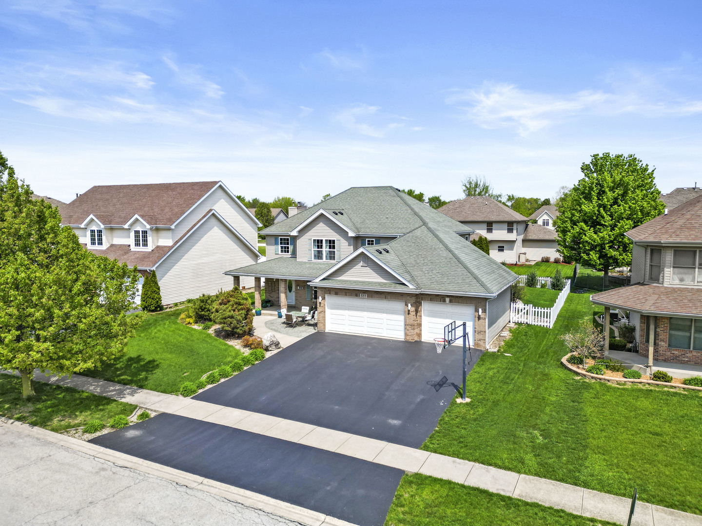 253 Aspen Drive Beecher, IL 60401 - Photo 16 of 17 a front view of a house with a yard