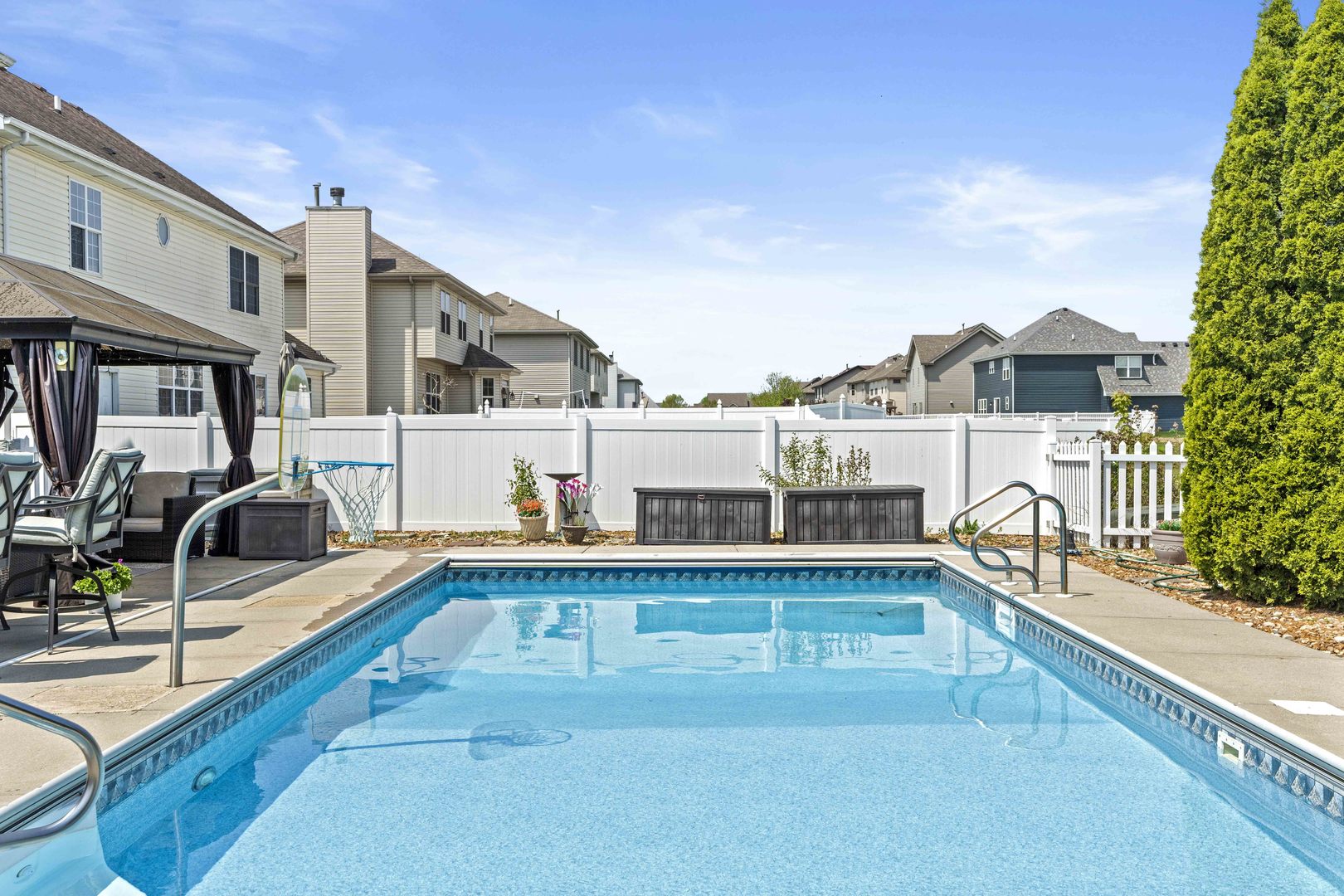 253 Aspen Drive Beecher, IL 60401 - Photo 4 of 17 a view of a house with pool and chairs