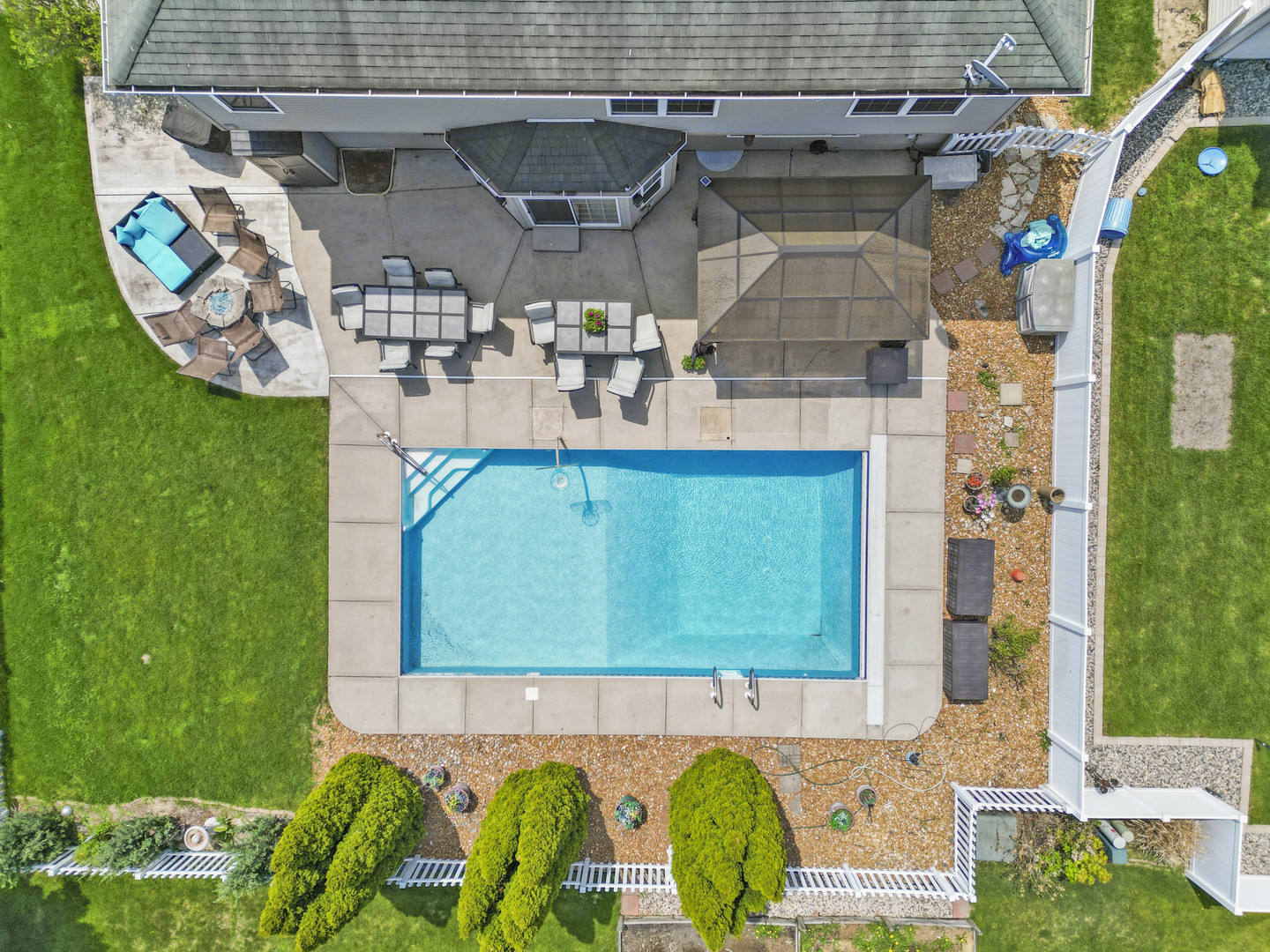 253 Aspen Drive Beecher, IL 60401 - Photo 6 of 17 a view of swimming pool with a yard and seating area