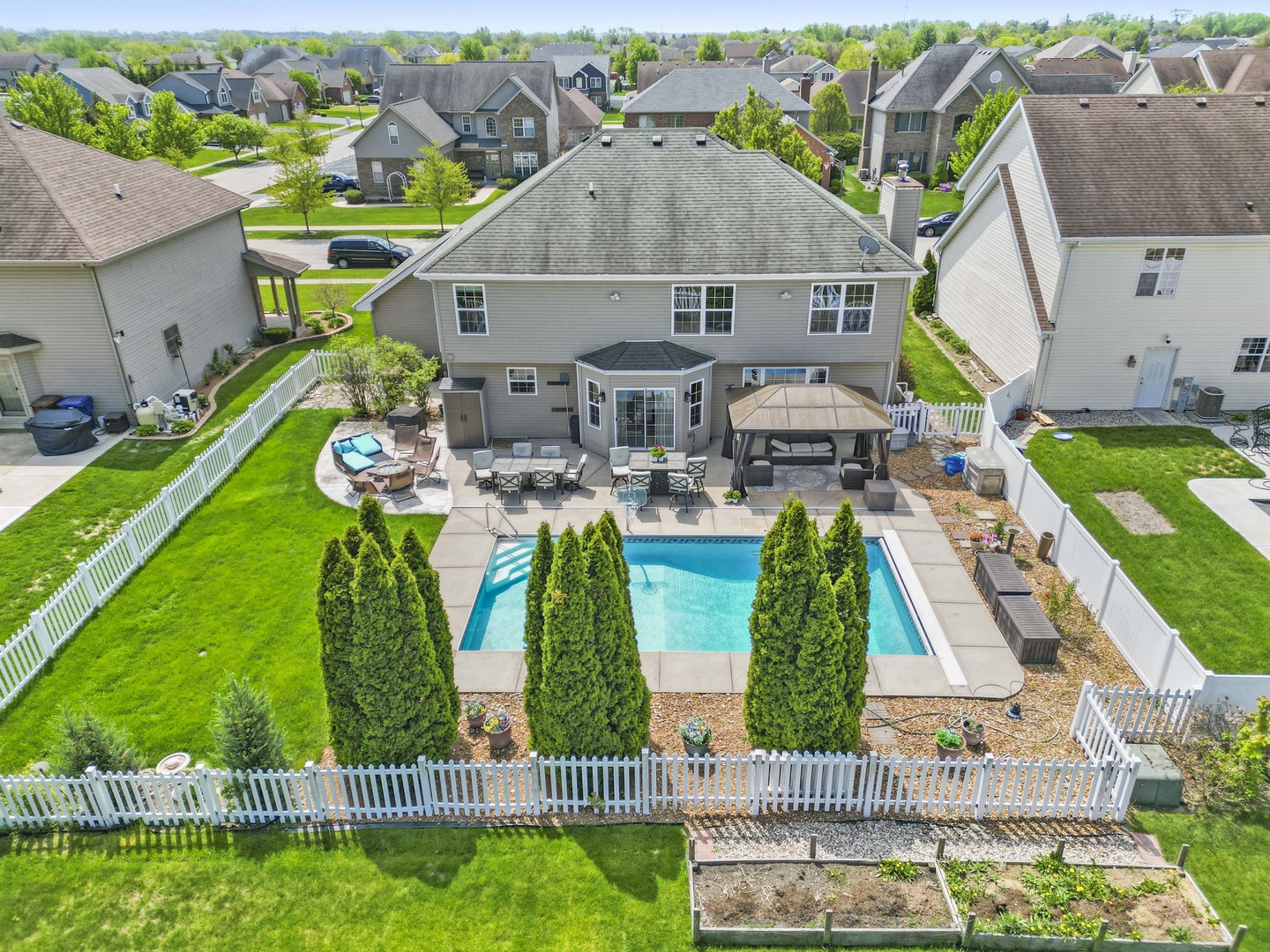 253 Aspen Drive Beecher, IL 60401 - Photo 9 of 17 an aerial view of a house with garden space and street view