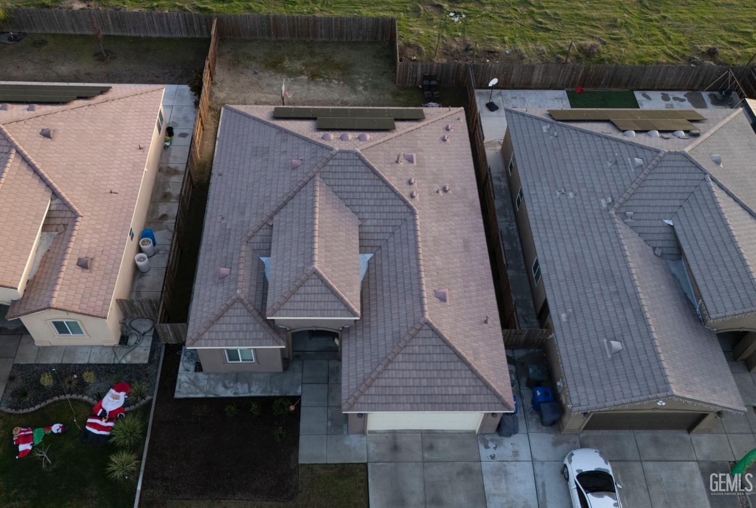 Undisclosed Address Wasco, CA 93280 - Photo 18 of 19 an aerial view of residential houses with outdoor space