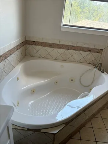 a bathroom with a bathtub