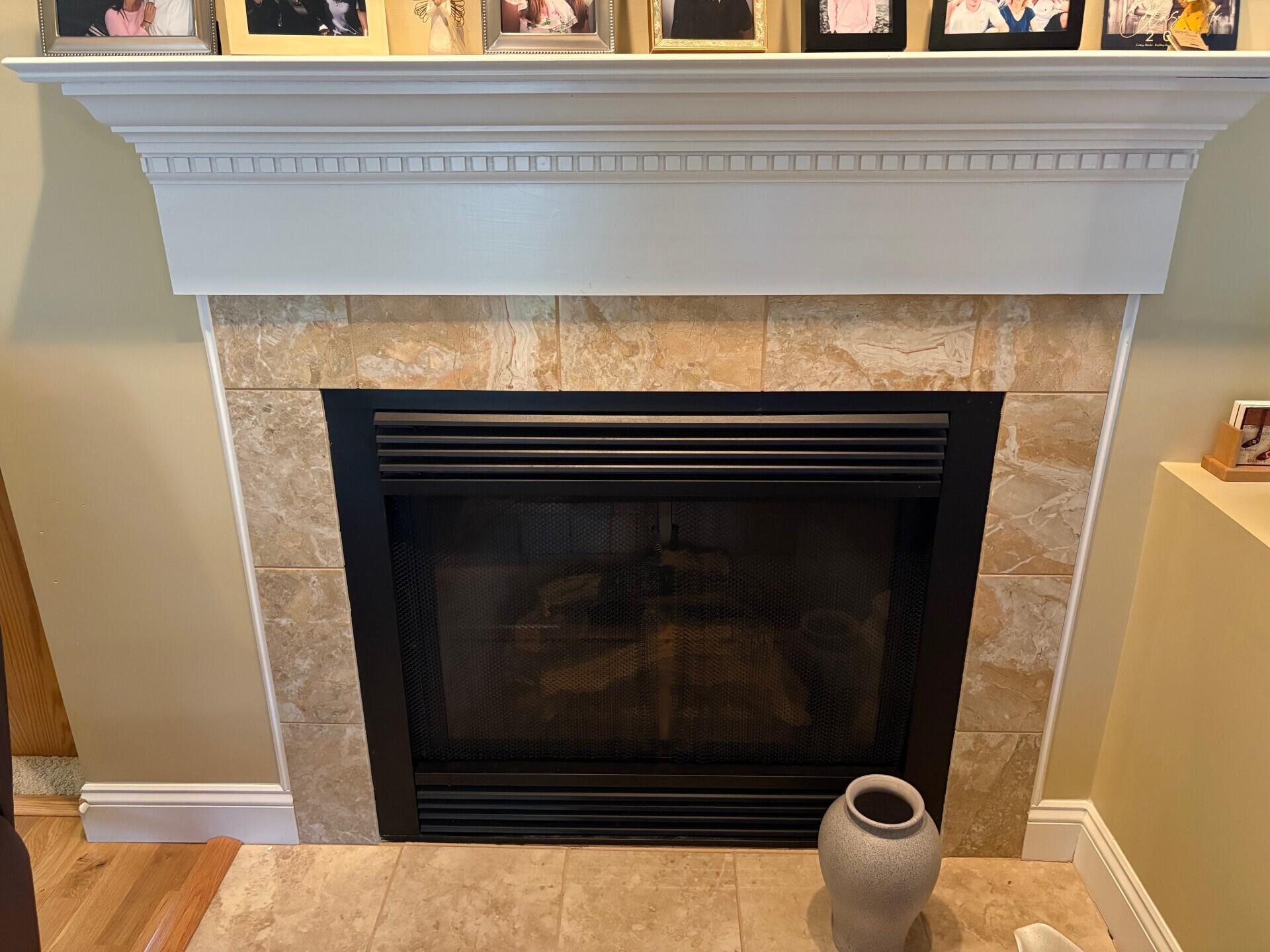 56 Kavanaugh Road, Unit 56 Old Orchard Beach, ME 04064 - Photo 16 of 32 fireplace
