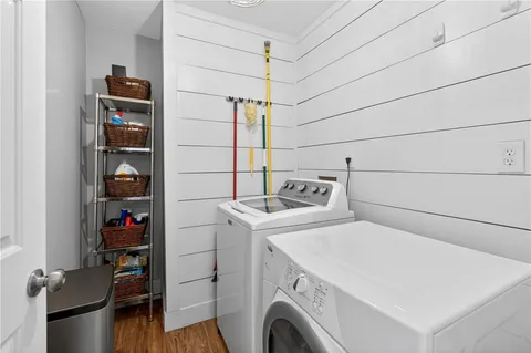 a view of entryway with wooden floor