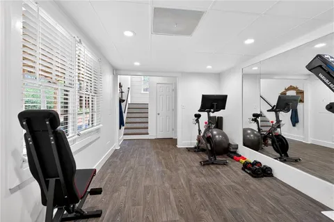 a living room with furniture and a patio