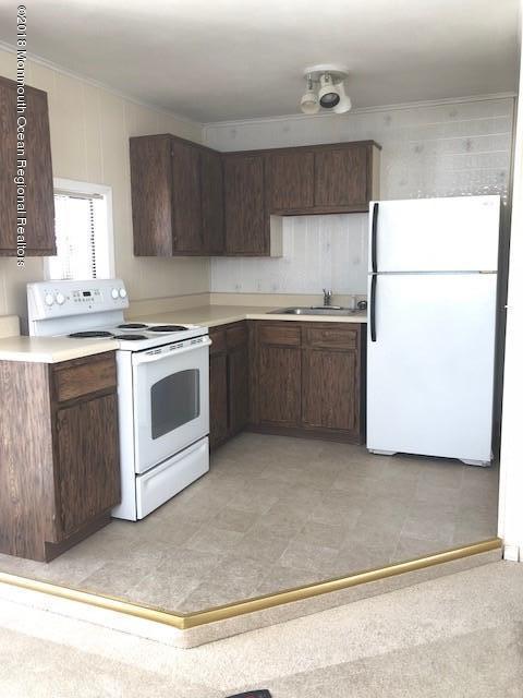 129 Queen Ann Road Brick, NJ 08723 - Photo 15 of 20 Downstairs kitchen