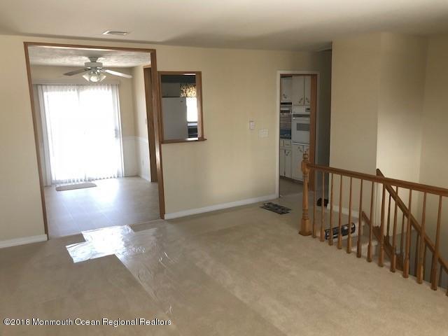 129 Queen Ann Road Brick, NJ 08723 - Photo 4 of 20 upstairs living rm and kitchen
