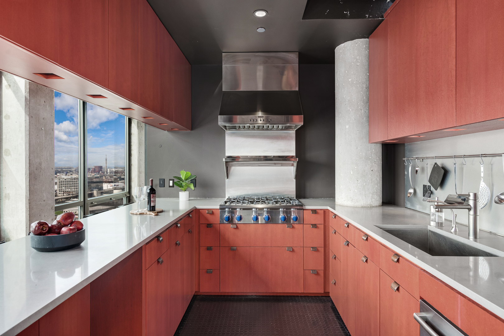 1530 South State Street, Unit 18AB Chicago, IL 60605 - Photo 12 of 54 a kitchen with kitchen island granite countertop a sink counter top space and cabinets