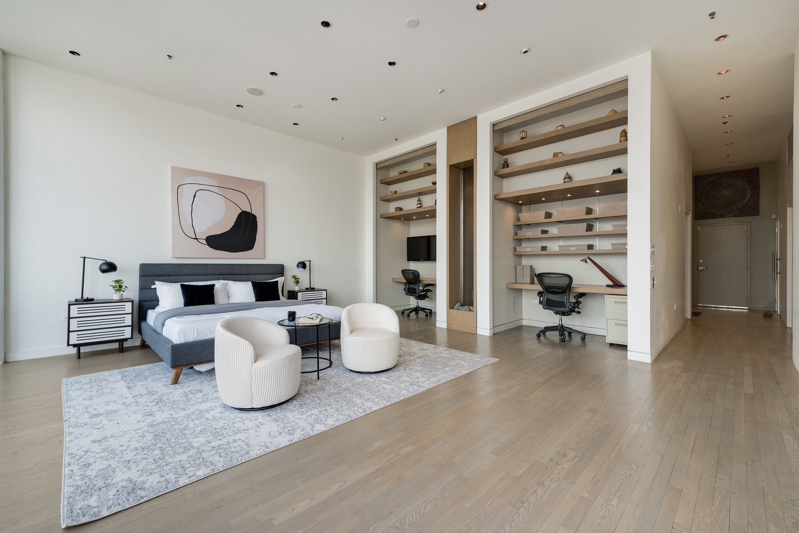 1530 South State Street, Unit 18AB Chicago, IL 60605 - Photo 18 of 54 a living room with furniture and wooden floor