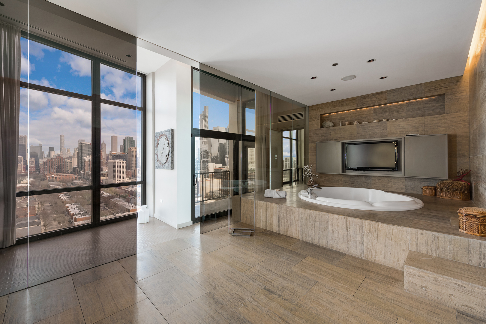 1530 South State Street, Unit 18AB Chicago, IL 60605 - Photo 21 of 54 a spacious bathroom with a tub a large window and mirror